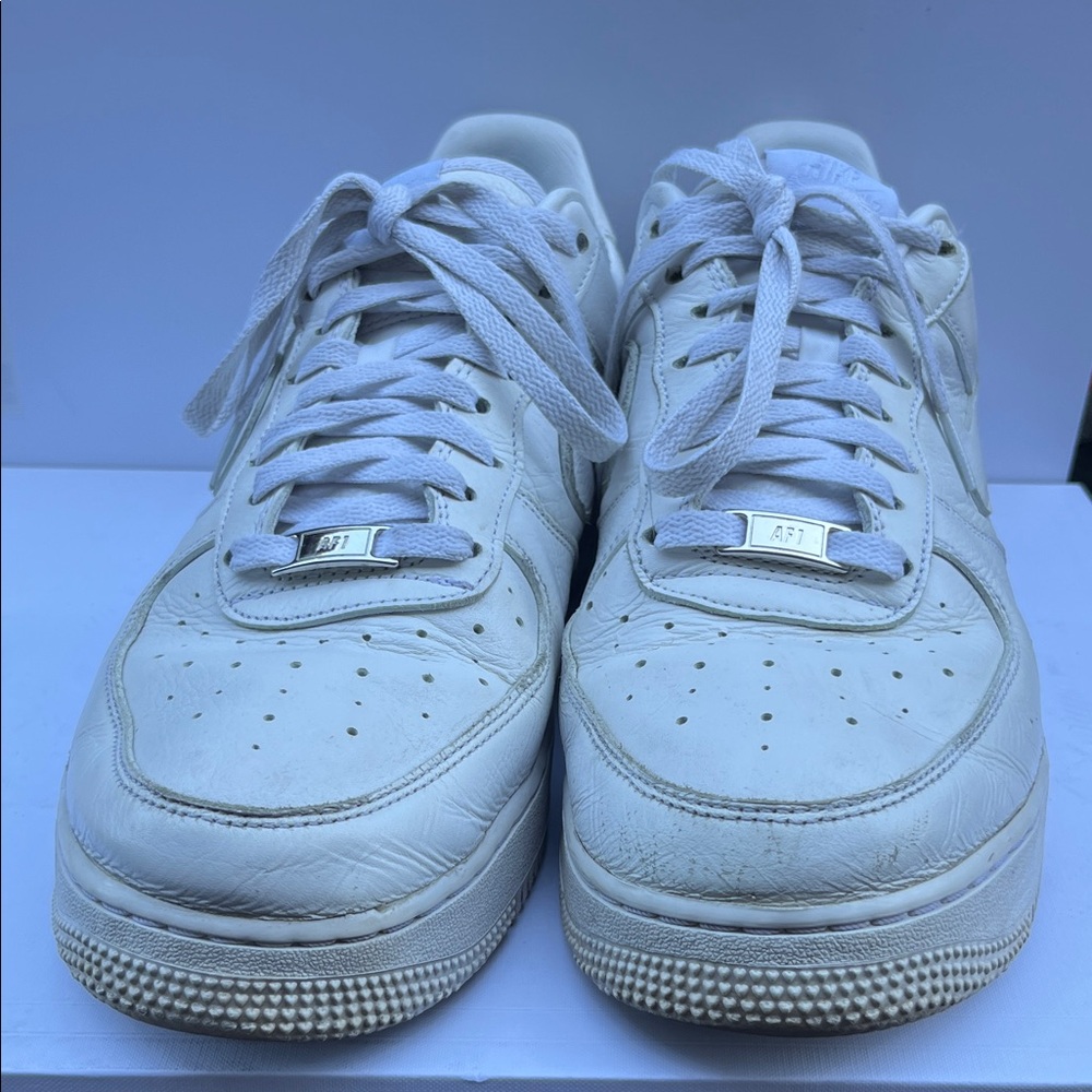 Nike Men's White Sneakers with Silver Details